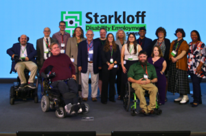 Group photo of Rebecca Cokley with SDI staff and board members on stage at the 2024 Starkloff Disability Employment Summit
