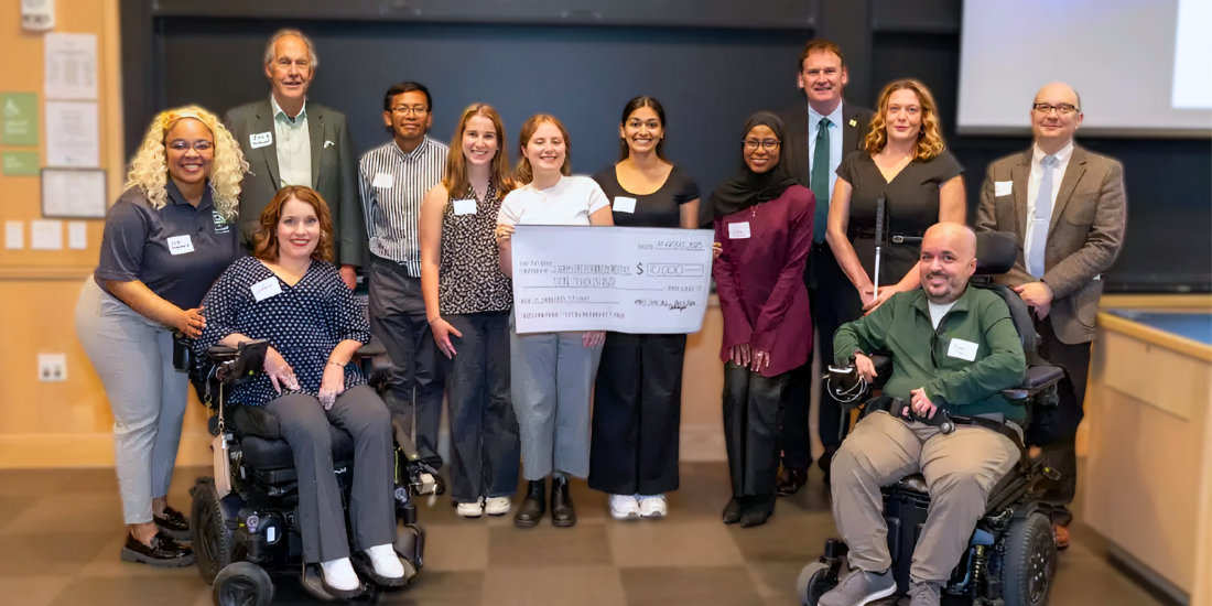 Access for All Grant Award at WashU Philanthropy Lab 2025 A group of WashU students and SDI leadership and staff smiling during the check presentation.