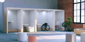 Office cubicles with different desk heights for standing, fixed seating, wheelchair, and office chair.