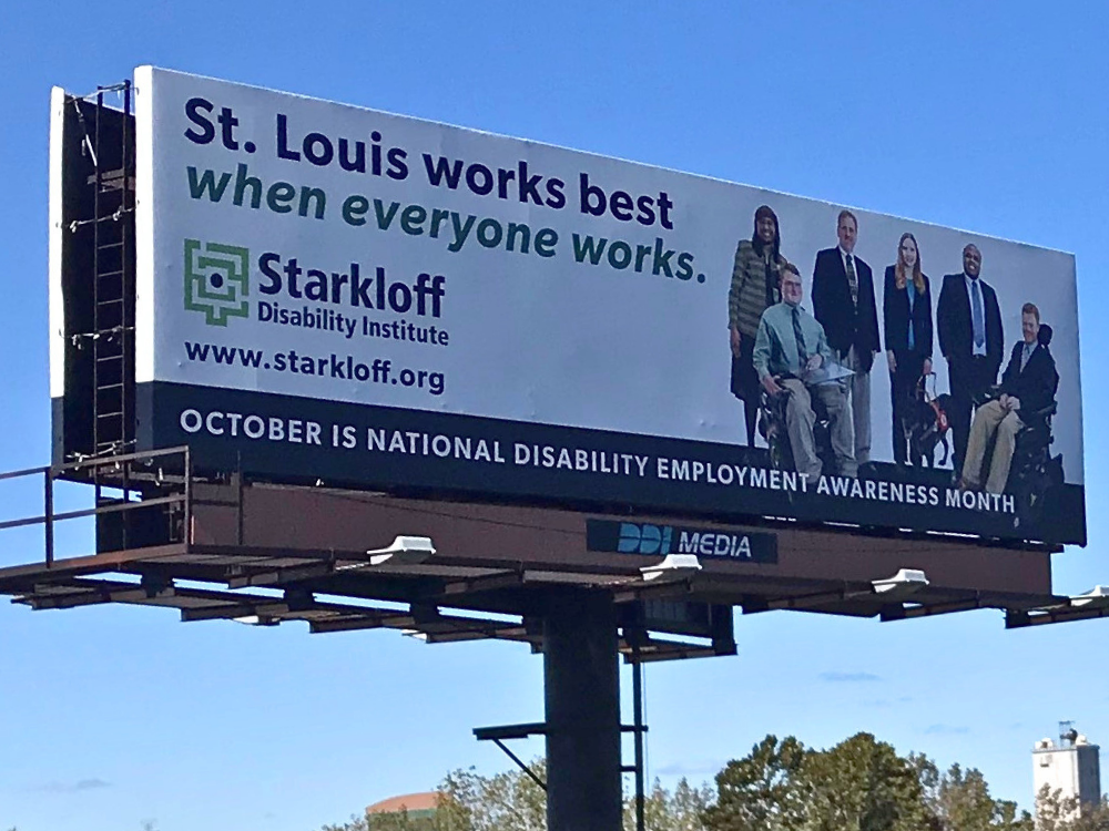NDEAM billboard. Billboard: St. Louis works best when everyone works. Starkloff Disability Institute. October is National Disability Employment Awareness Month. Six disabled professionals smiling confidently.