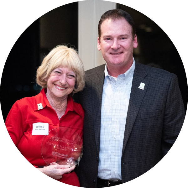 cks-degnan-ar22 Colleen smiling with Board Chair Steve Degnan after her retirement.